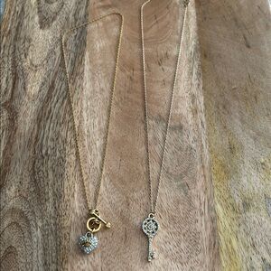 Juicy Couture choker style necklace . Comes with free key necklace